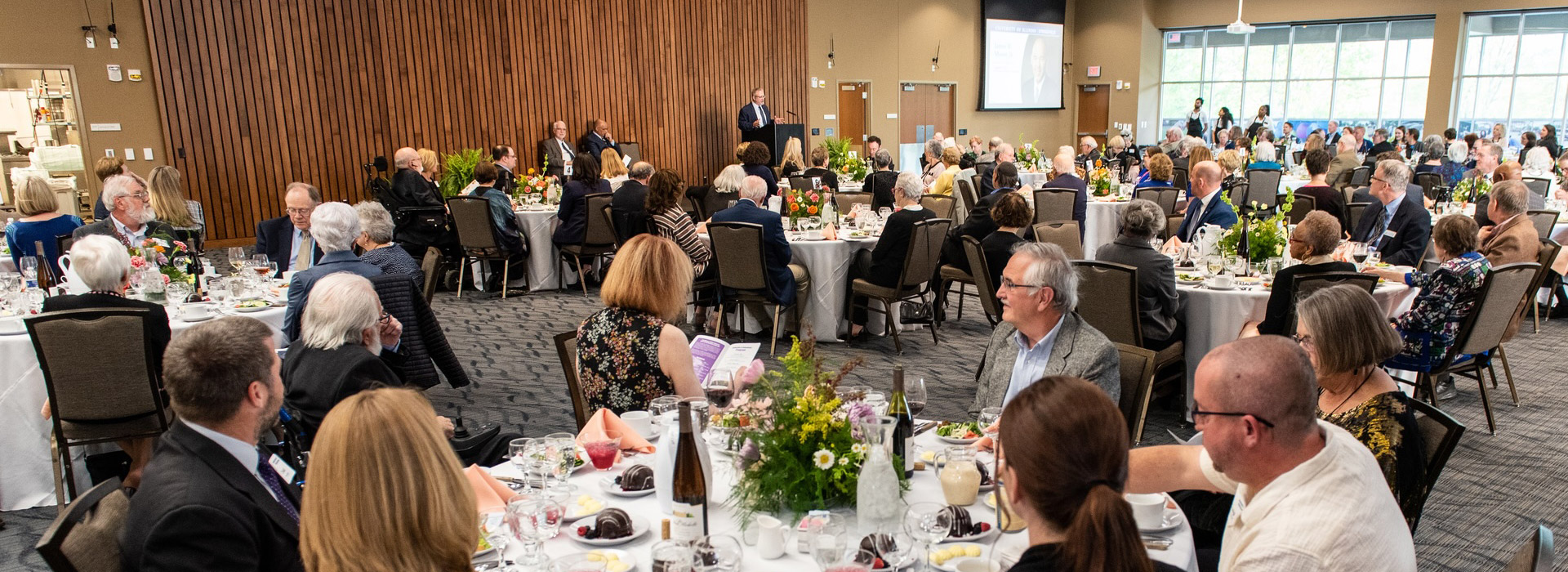 attendees of the Celebration of Philanthropy dinner listening the the speaker talk