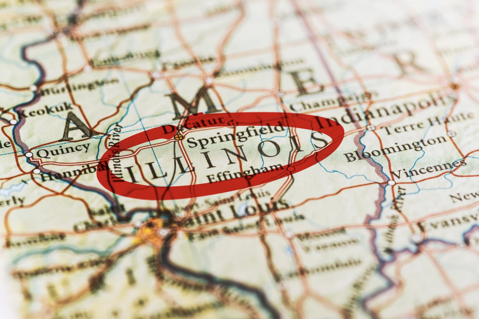 A picture of a Illinois state on the map which is highlighted with a red inked circle 