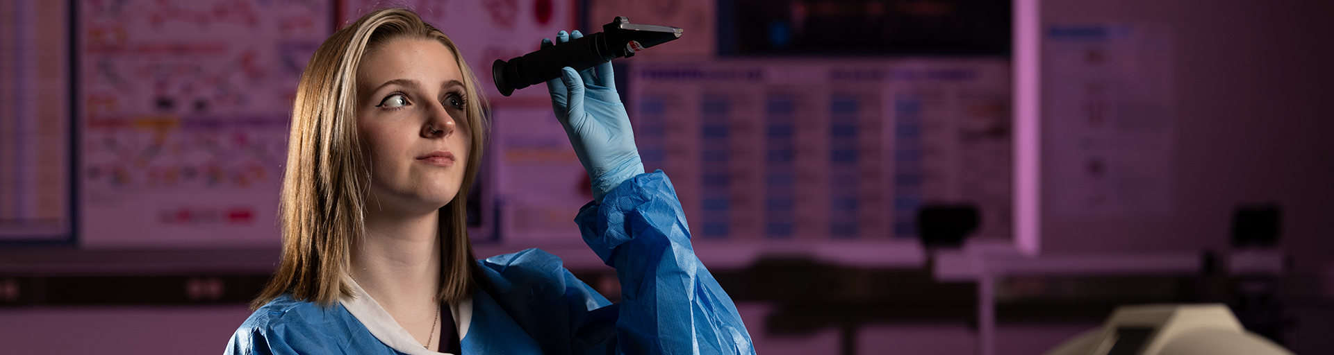 Student using lab equipment