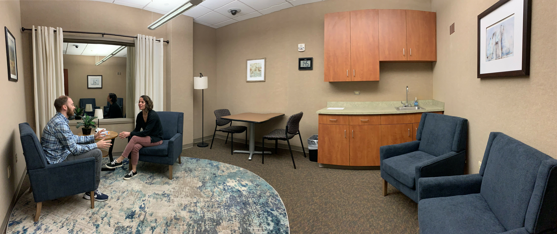 Dr. Blaum (left) and Dr. Bolivar (right) in the Psychology Department observation suite