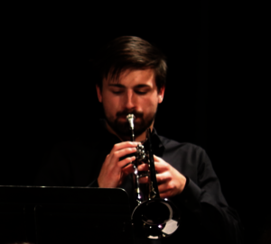 man playing trumpet