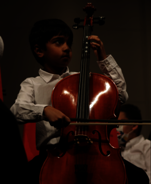Kid playing cello