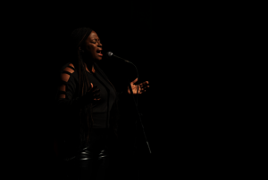 Woman singing with a microphone